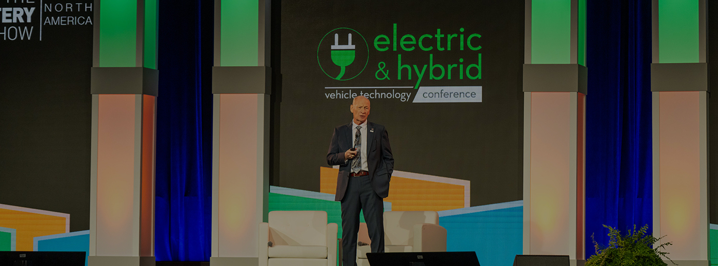 A keynote speaker on stage on The Battery Show & EV Tech Expo 